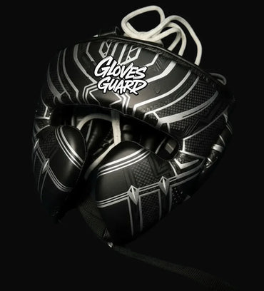 Black and white boxing Headguard with 'Gloves Guard' branding on a black background