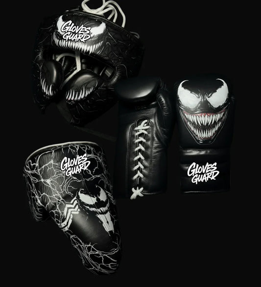 Black boxing gloves with Venom design and 'Gloves Guard' branding on a black background