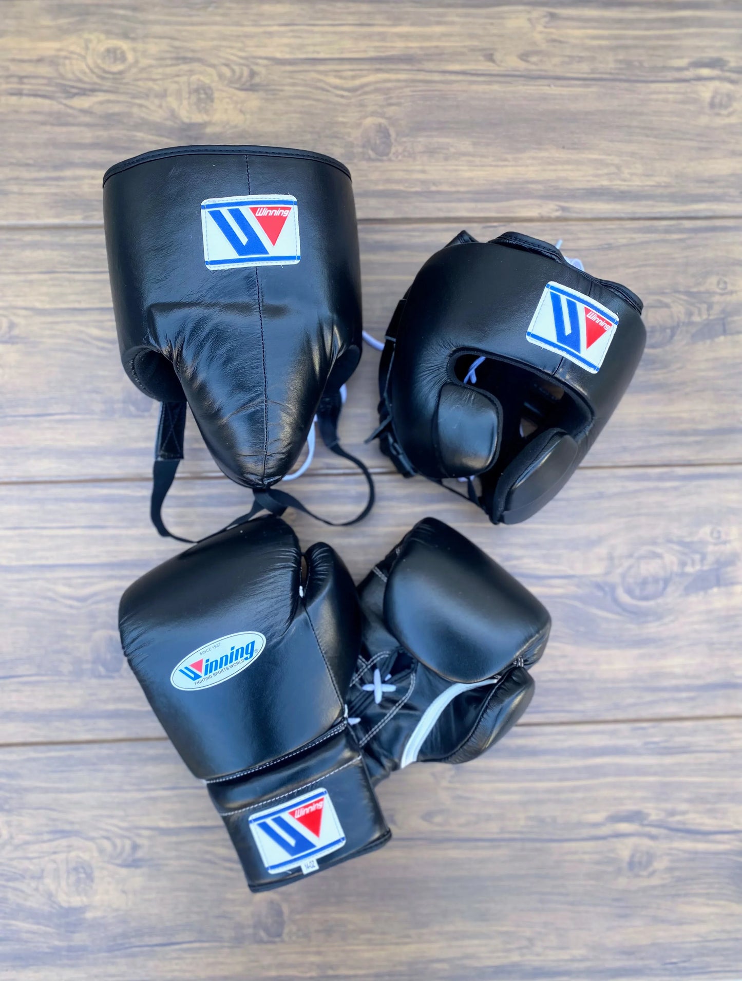 Set of Winning Black Boxing Gloves with Cheek Protector Headgear