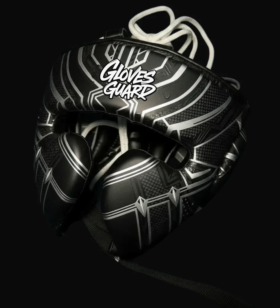 Black and white boxing Headguard with 'Gloves Guard' branding on a black background
