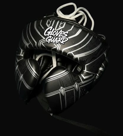 Black and white boxing Headguard with 'Gloves Guard' branding on a black background