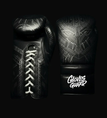 Black boxing gloves with tribal patterns and 'Gloves Guard' branding on a black background