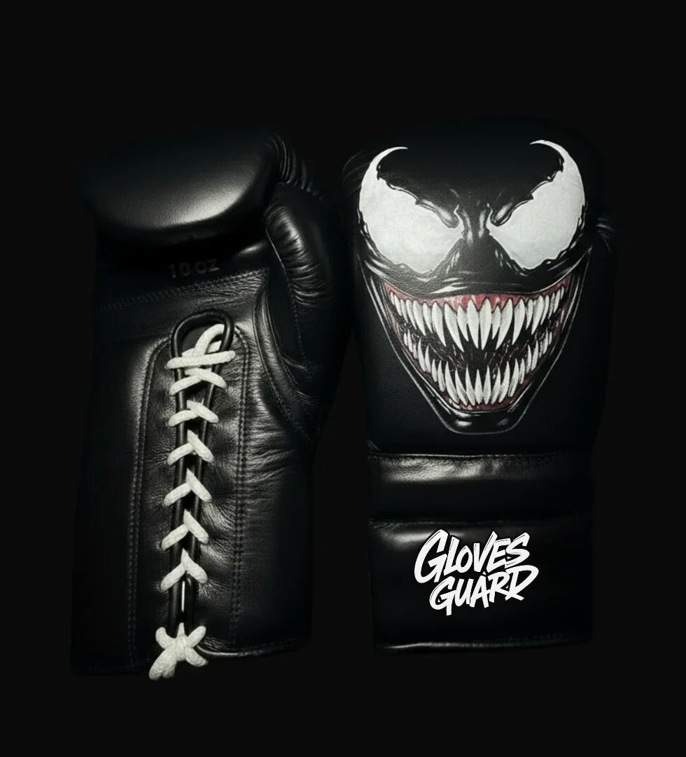 Black boxing gloves with Venom design and 'Gloves Guard' branding on a black background